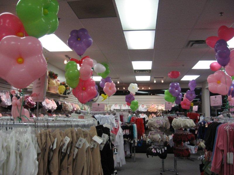 Clothing
                store displaying Showroom Balloons